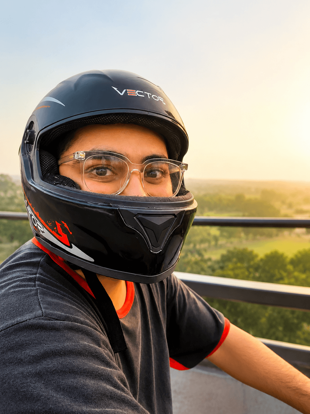 Vector Red Lightning helmet front view with rider glasses