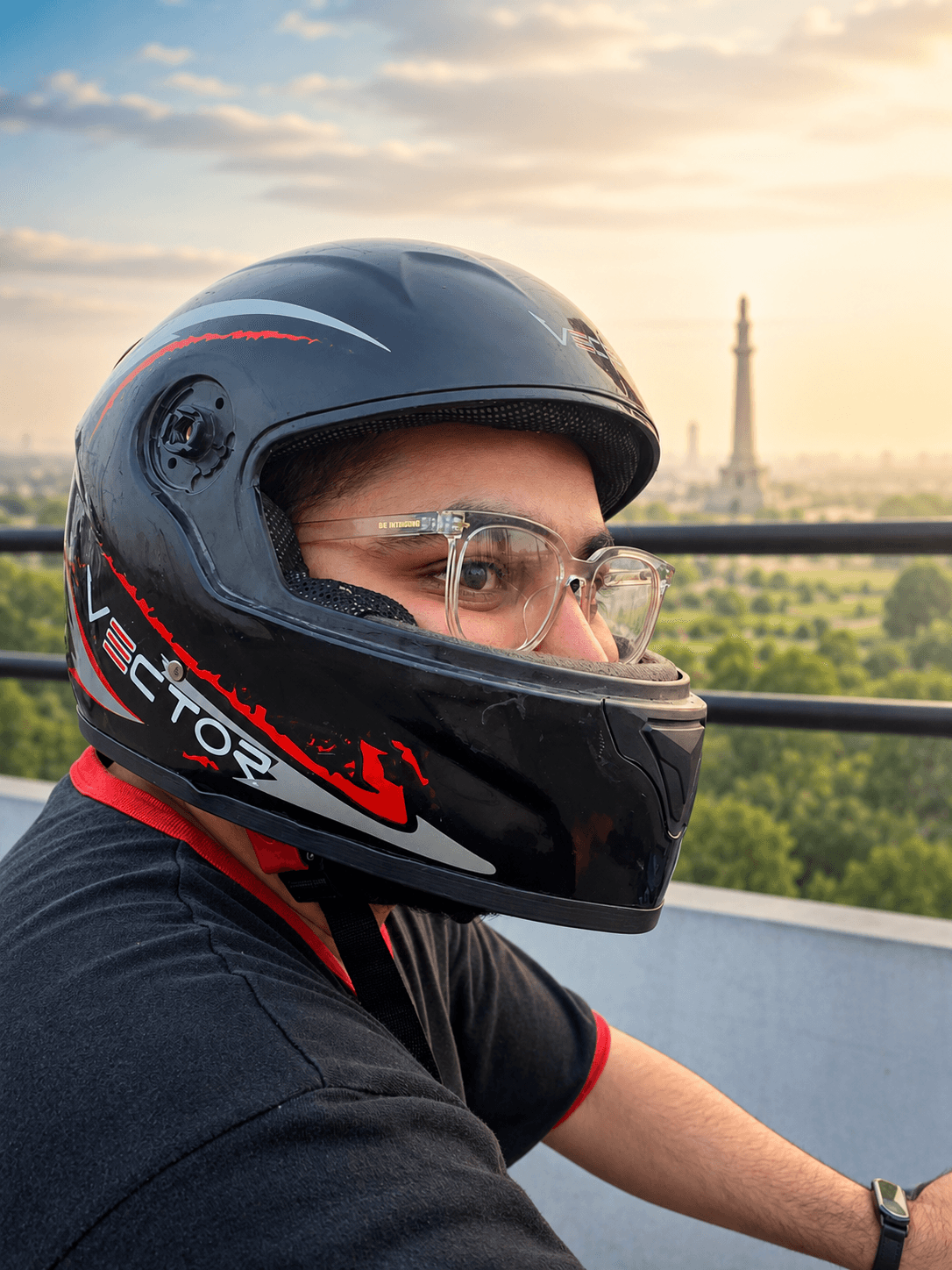 Vector Red Lightning full-face helmet side profile on a rider in Lahore